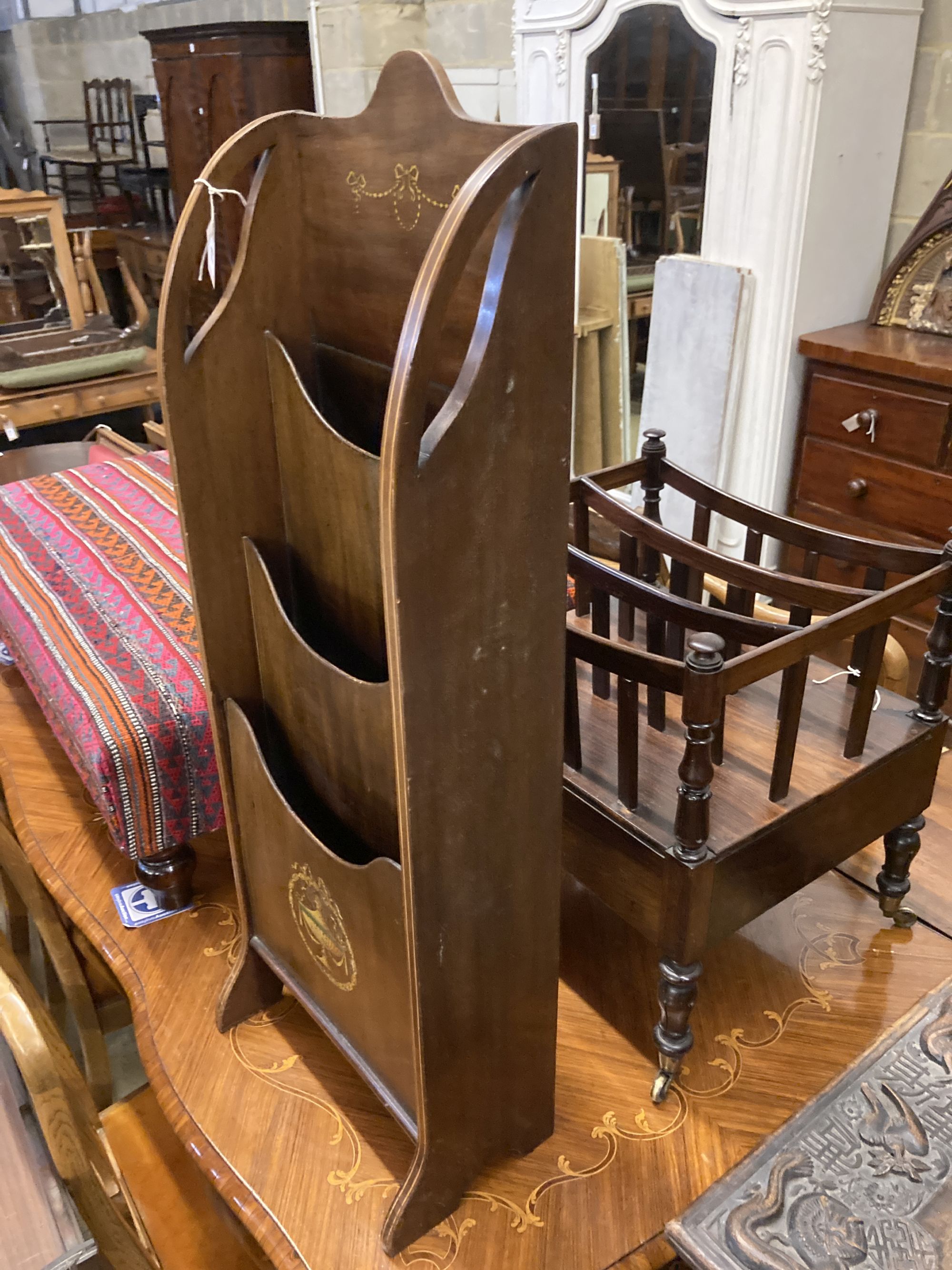 An Edwardian mahogany stencil decorated newspaper stand, width 37cm, depth 22cm, height 102cm